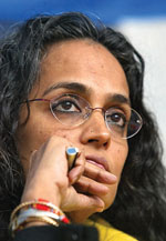 Indian rights activist and 1997 Booker prize winner Arundhati Roy attends the releasing a report by the Committee Against Violence On Women, an independent group's study, in New Delhi, India, Thursday, Jan. 18, 2007. A militia set up by the government to fight Maoist rebels in the eastern state of Chhattisgarh was preying on poor tribal women the group said Thursday. The "Salwa Judum," an anti-Maoist movement, was set up by the state government in 2005 to combat the rebels. (AP Photo/Mustafa Quraishi)