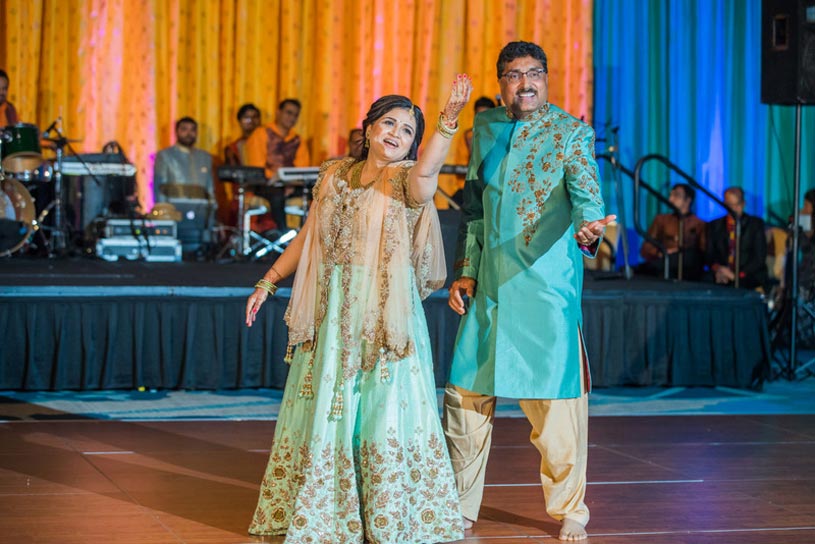 Indian Groom's Father and Mother doing Dance Performance