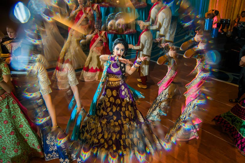 Beautiful Indian Bride Dancing with Guest