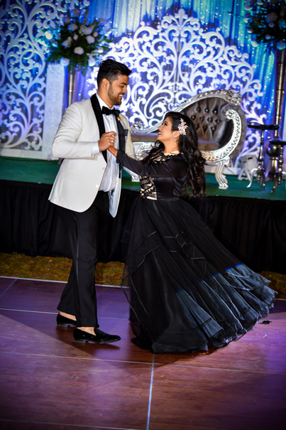 Indian Bride and Groom Doing Dance Performance in Wedding Reception 