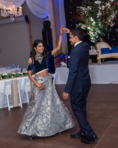 Sweet indian bride dancing with her Groom