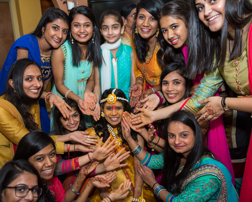 Pre Wedding Haldi Ceremony Applying Haldi on Indian Bride's Face