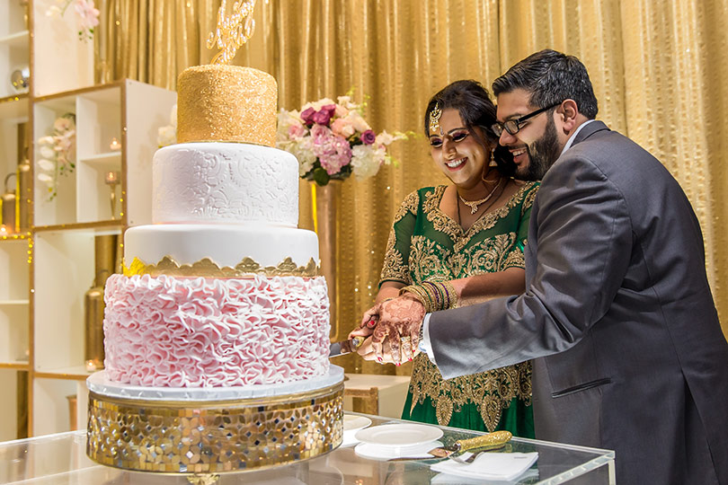 Cake Cutting Capture of Love Birds at Reception Ceremony 