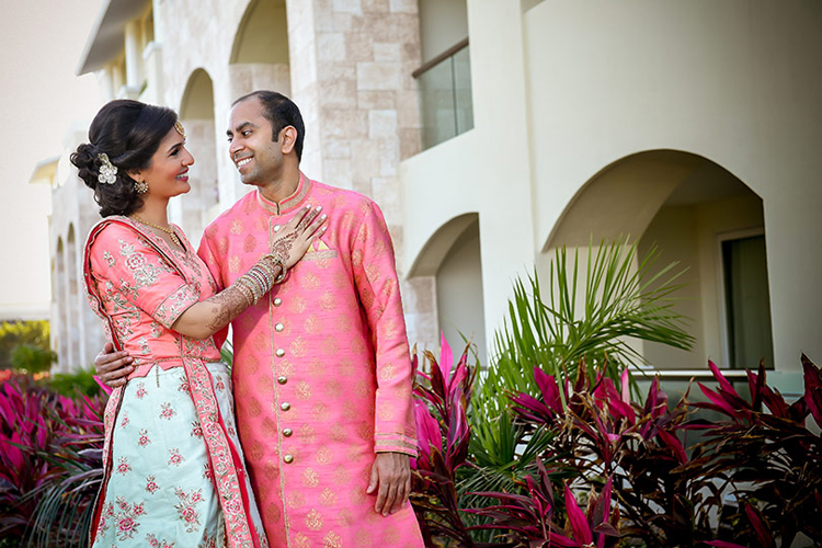 Enchanting Indian bride and groom outdoors capture.