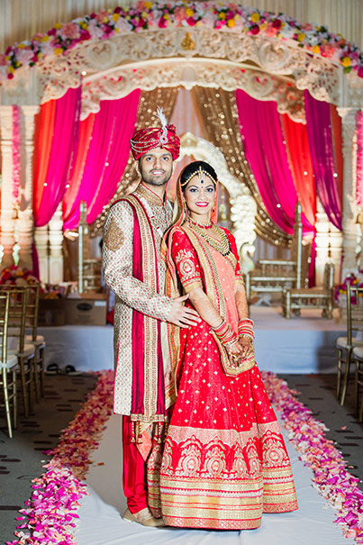 Indian Bride and Groom Capture Under Wedding Mandap