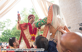 Indian Bride and Groom enjoying Garland Ceremony Photography