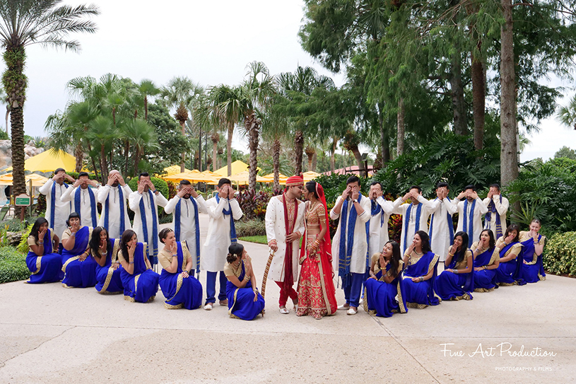 Indian Couple posing with friends and Family