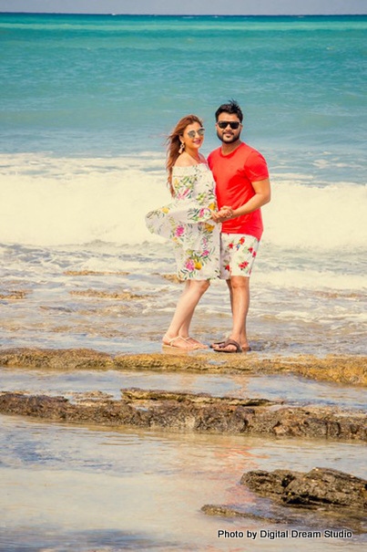 Indian Couple posing for the photoshoot before the wedding