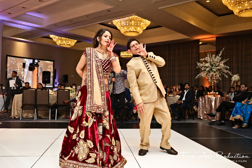 bride having performance at the wedding sangeet