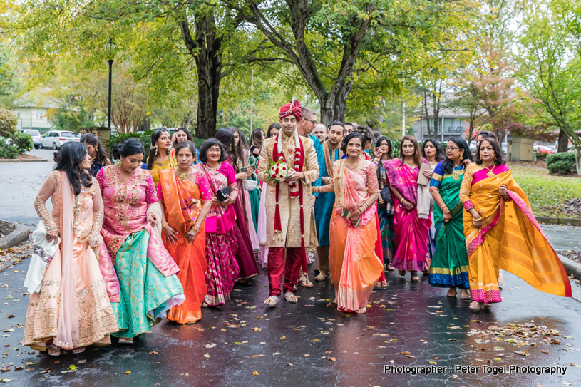 Groom waiting with the family and friends at baraat