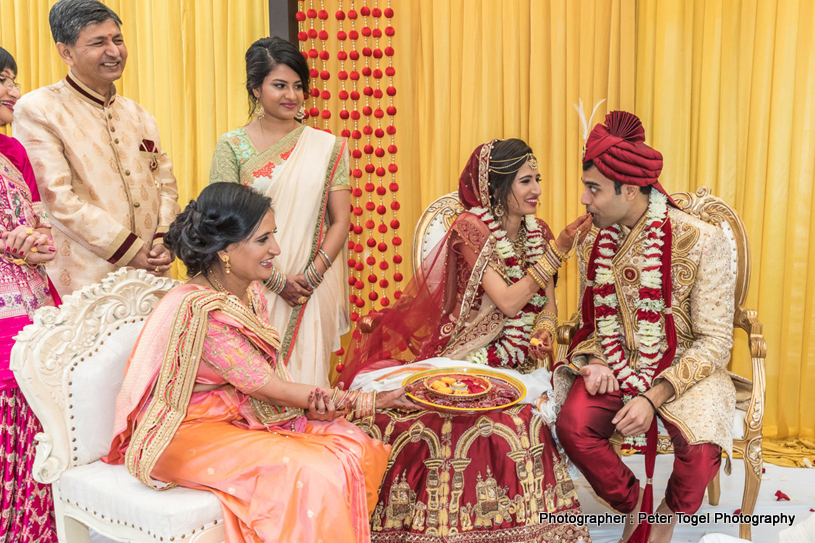 Bride feeding Groom at the ceremony