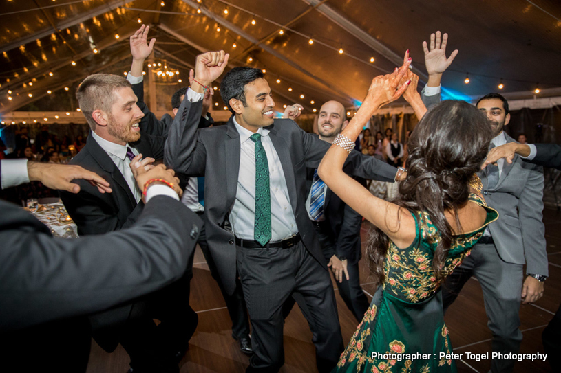 Indian Bride and Groom Dancing at Reception