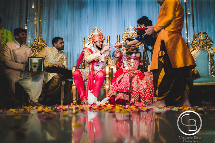 Mother giving gift to the groom