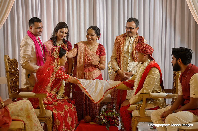 Mom applying Sindoor to Indian Bride