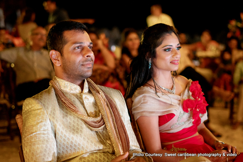 Indian Couple attending the wedding ceremony