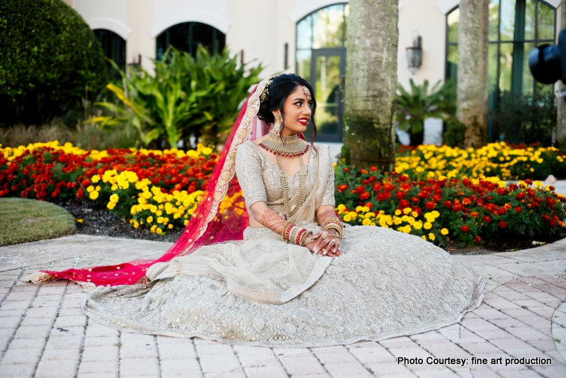 Lovely Indian bride Posing Outdoor for photoshoot