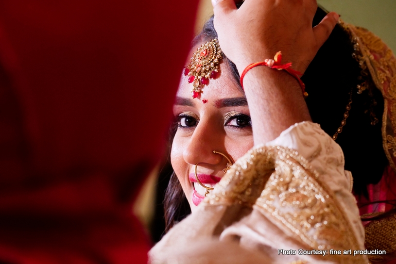 Applying Sindoor to Indian Bride