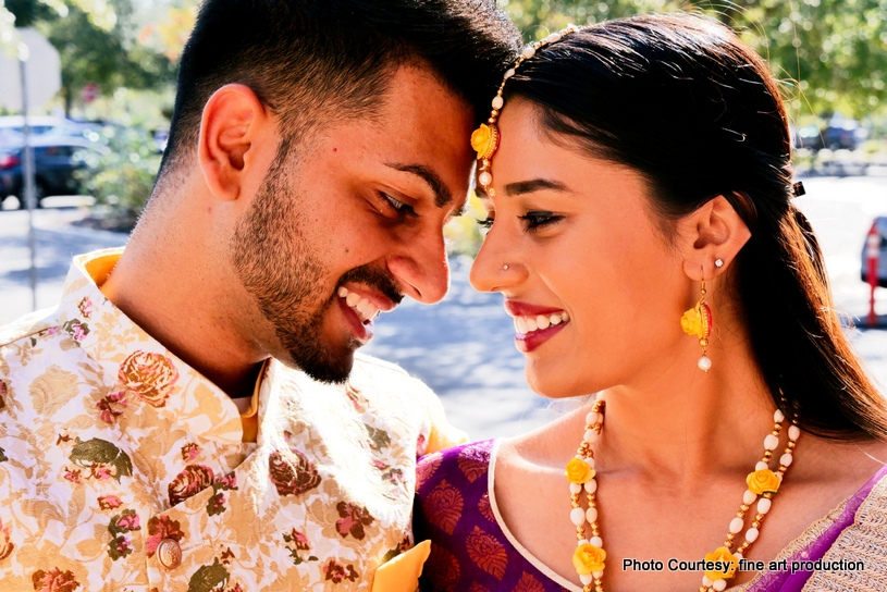 Indian Bride and Groom posing for a photo