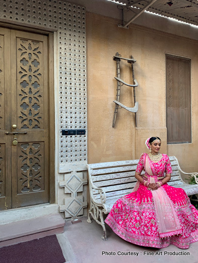 IIndian Bride to be posing at maharani suite