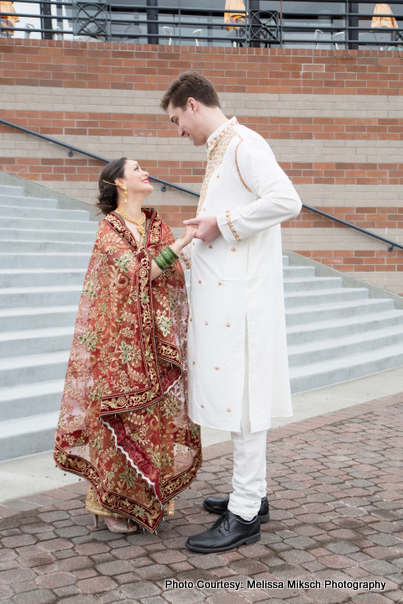 Bride and Groom looking to each other with love