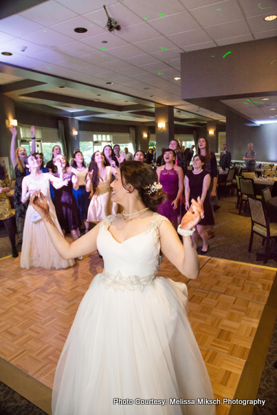 Bride throgh her bouquet ritual