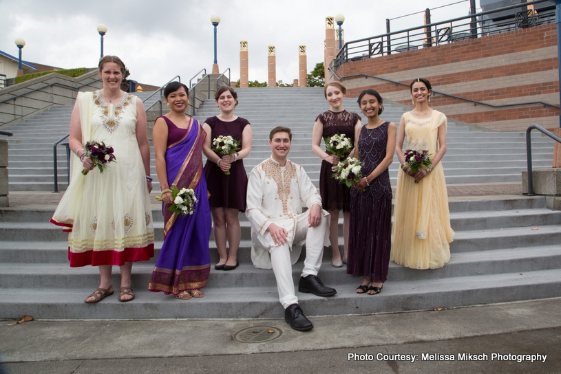 Groom with bridesmaids