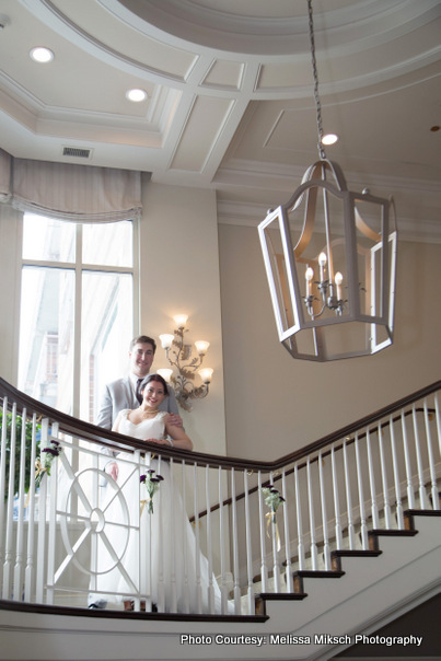 Couple standing in gallery