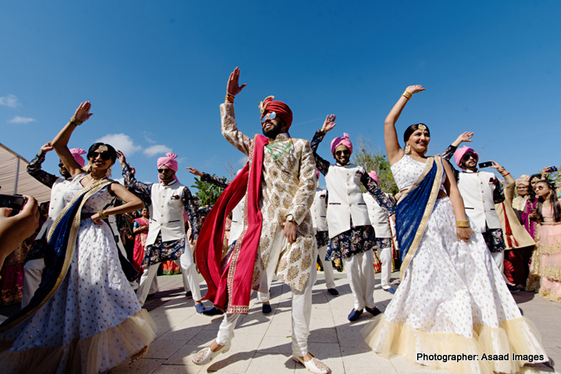 Indian Bride dancing with Indian Bridesmaid and Groomsmen