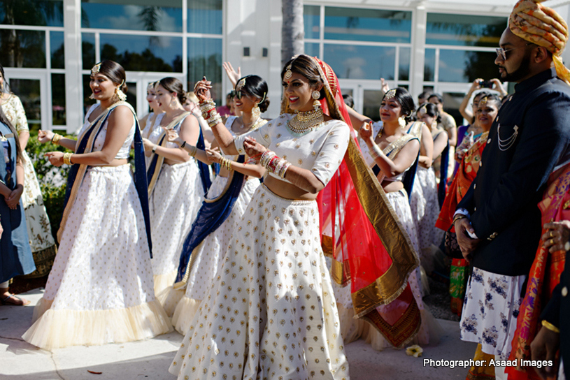Indian Bride dancing with Baraat Guest