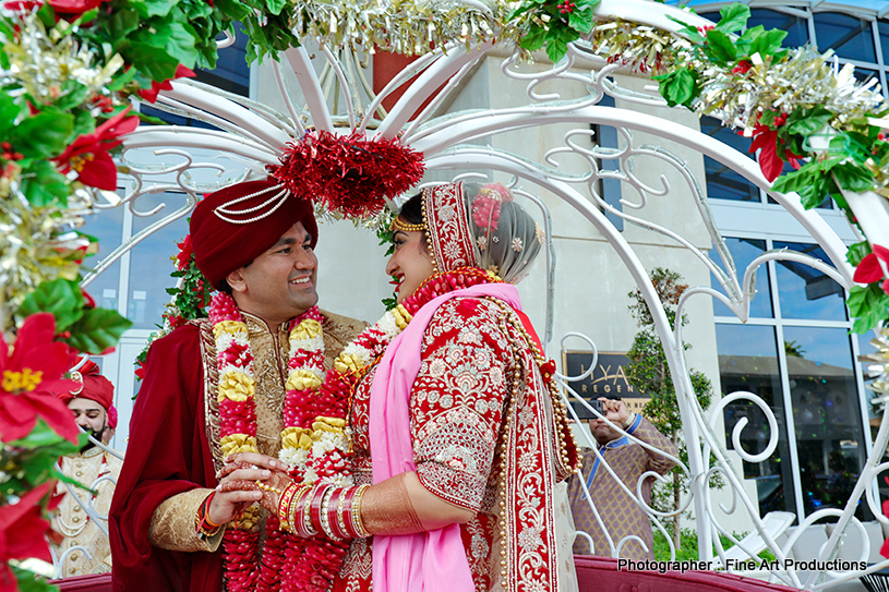 Indian Bride and groom smiling during photoshoot