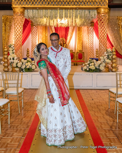 Indian Bride and Groom Under wedding Mandap