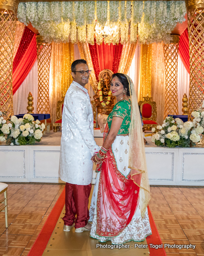 Indian Bride and Groom Holding hands to each other