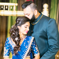 Indian Groom Kissing Brides Forehead