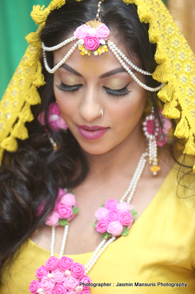 Indian Bride's Family Apply Haldi on her face at Haldi Ceremony