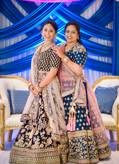 Bride posing with her cousin