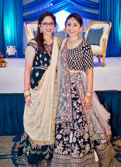 Bride posing with her cousin