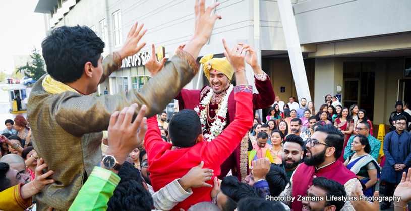 Groom dancing at the baraat