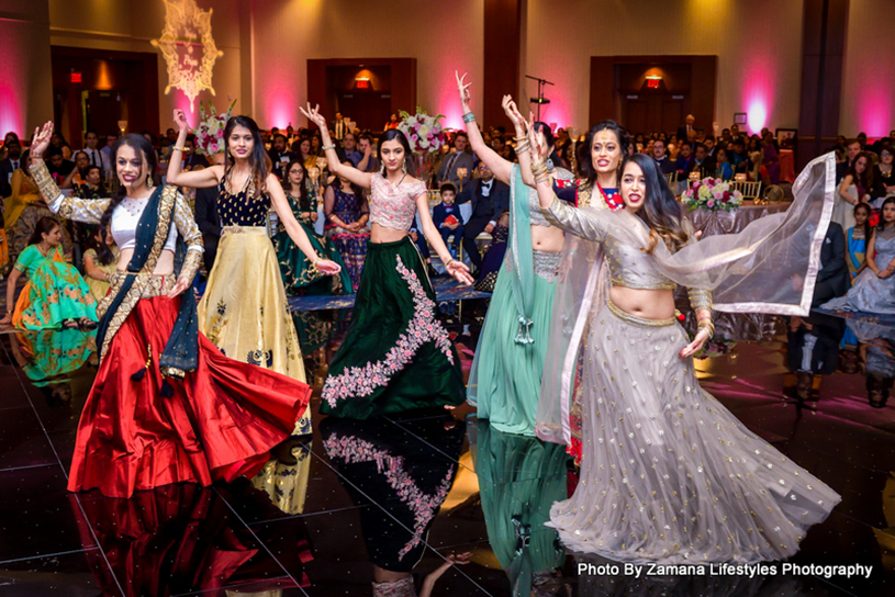 Friends and Family Dancing at the wedding Sangeet