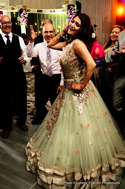 Indian Bride Dancing at the reception