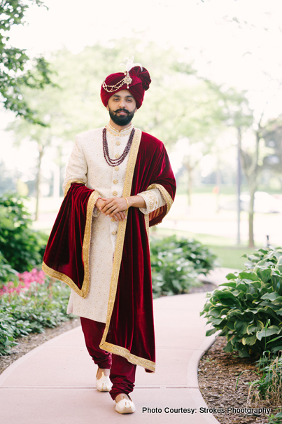 Groom posing for the photo