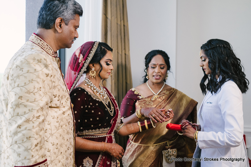 Indian Bride posing with Family