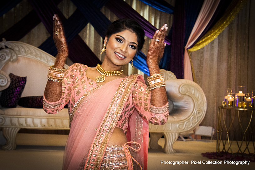 Glamorous indian bride dancing photography