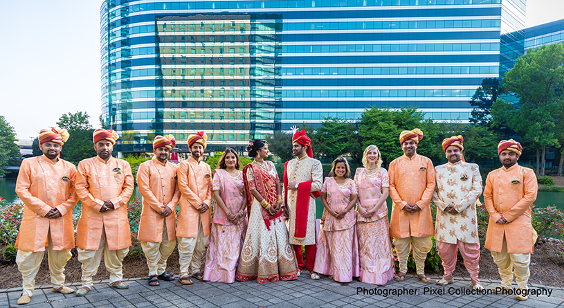 Cute indian Couple with bridesmaids and groomsmens
