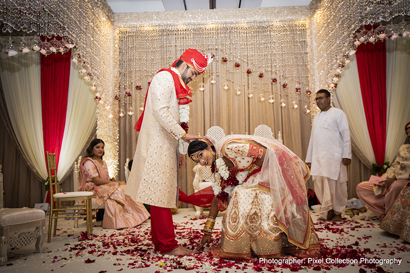 Bride Touching Indian groom's Feet