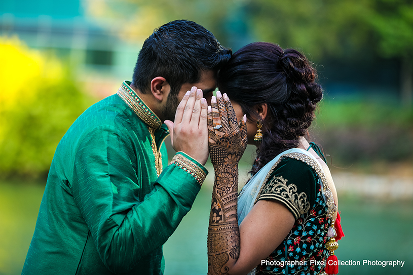 Lovely capture of Indian bride and groom holding each other