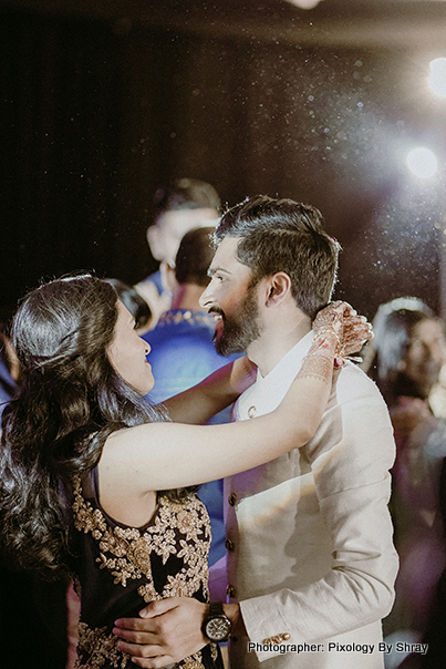 Adorable indian bride and groom smiling capture