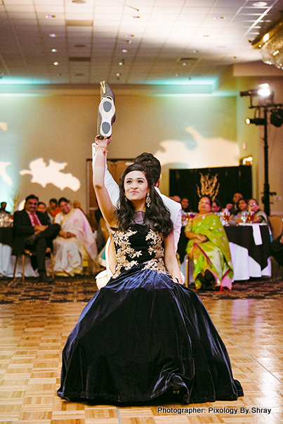 Indian Couple Playing at the Wedding Reception