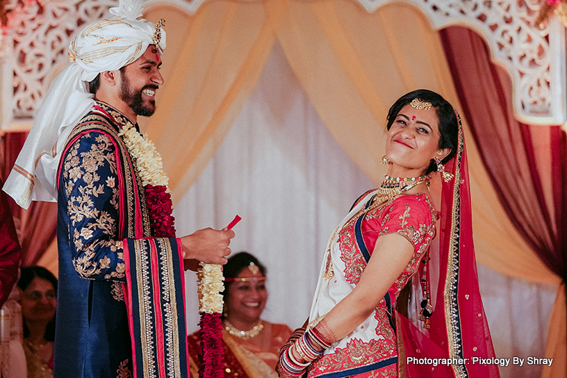 Indian Couple exchanging Garland at the ceremony