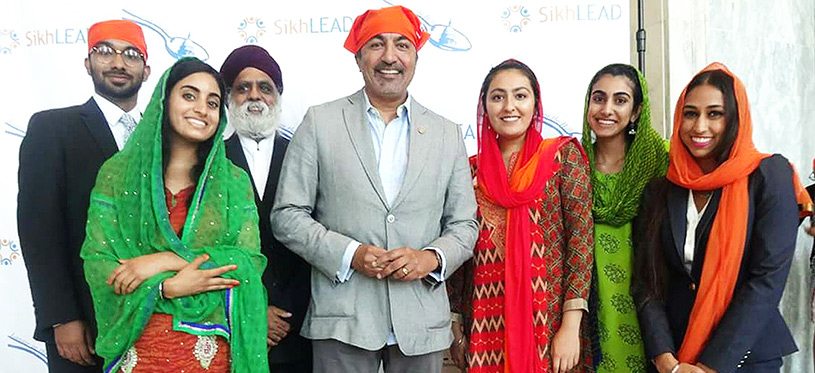 Democratic Congressman Ami Bera of California is flanked by SikhLEAD interns and leaders of SALDEF at the fourth annual Langar on Capitol Hill