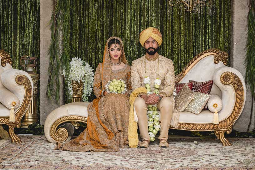 Groom wear either Kurta Pyjama, Sherwani, or formals like a suit, tuxedo, etc., whereas, for brides, it is Salwar Kameez or Sharara